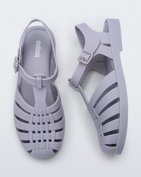 Side and top view of a pair of grey Possession sandals