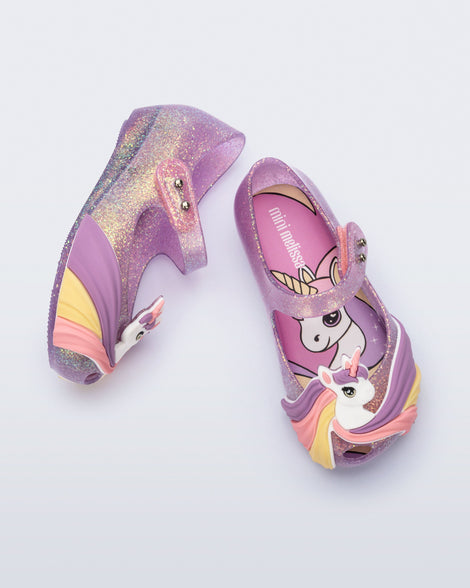 Top and side view of a glitter lilac baby Ultragirl Unicorn with a unicorn with a rainbow mane on the upper toe area