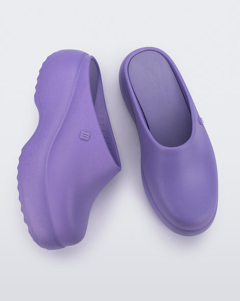 Side and top view of a pair of purple Free Clog Platforms