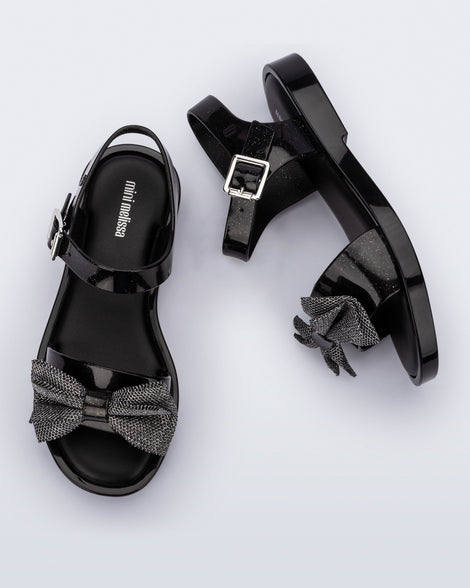 Top view of a pair of glitter black Mar Sweet kids sandals