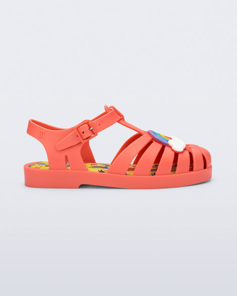 Side view of a matte red kids Possession + Play Doh sandal