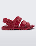 Side view of a red Lock Sandal with back strap