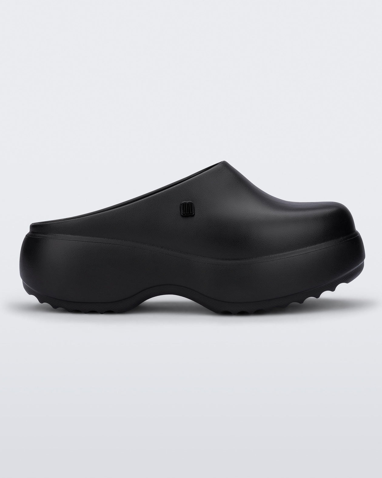 Side view of a black Free Clog Platform.