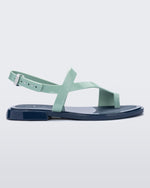 Side view of a green Cassie sandal