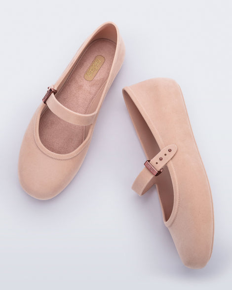 Side and top view of a pair of pink Soft Ballerina Velvet flats