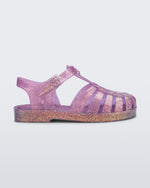 Side view of a glitter lilac kids Possession sandal