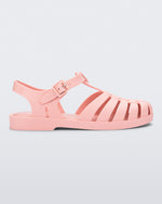 Side view of a light pink Possession sandal