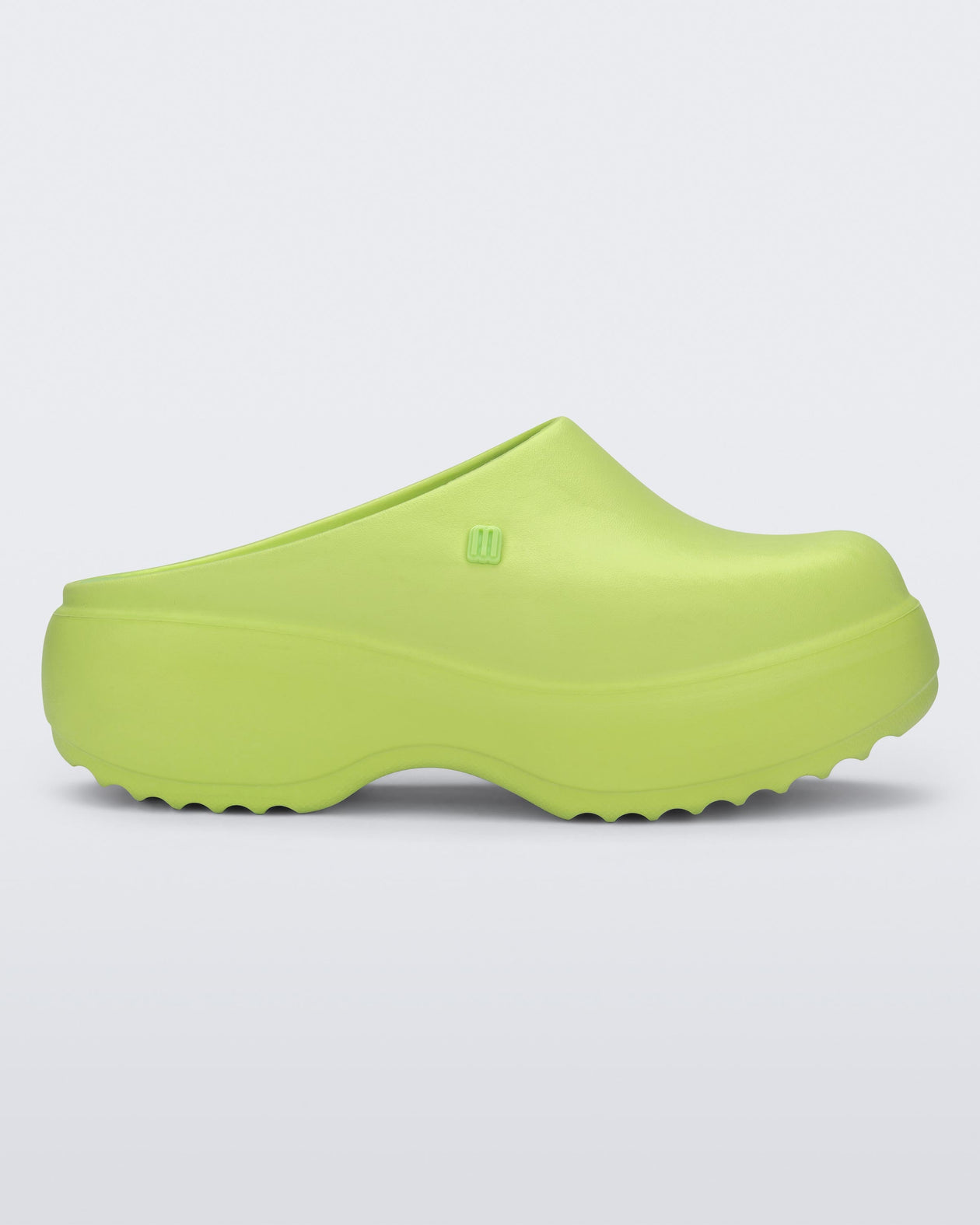 Side view of a green Free Clog Platform.