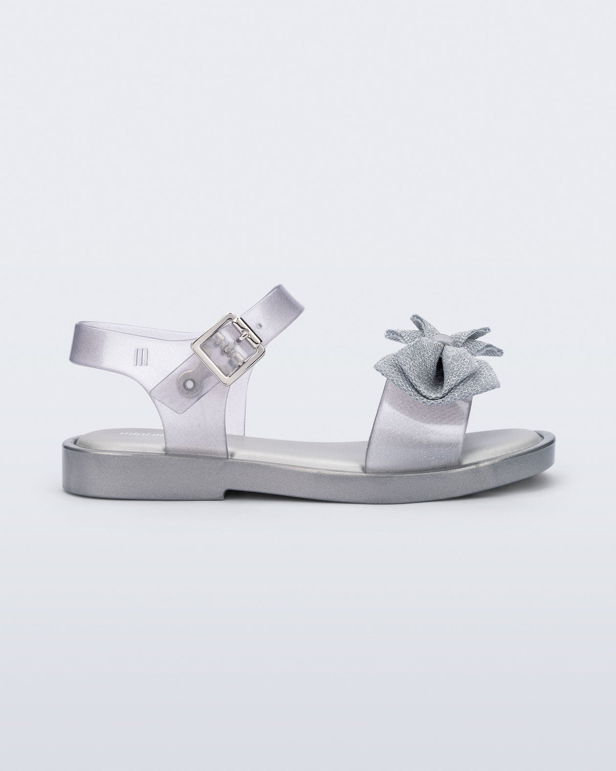 Side view of a  pearly silver Mar Sweet kids sandal