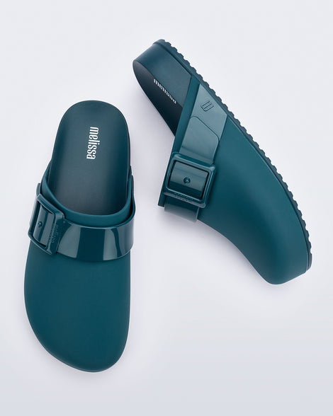 Top and side view of a pair of blue Cozy Clog.