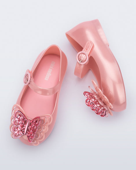 Top and side view of a pair of pink Sweet Love baby flats