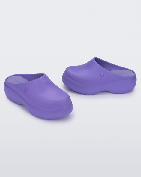 Side and angled view of a pair of purple Free Clog Platforms