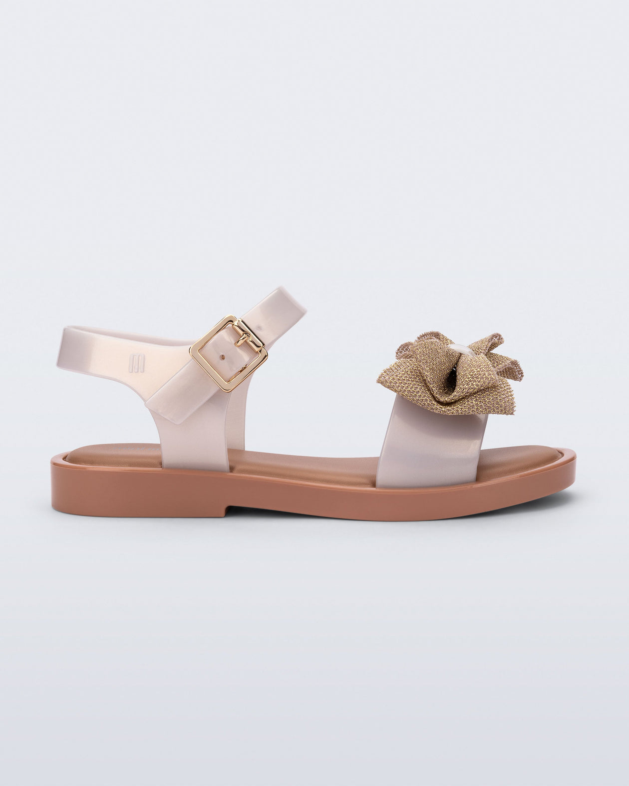 Side view of a  pearly beige Mar Sweet kids sandal