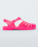 Side view of a pink Possession fisherman style sandal.