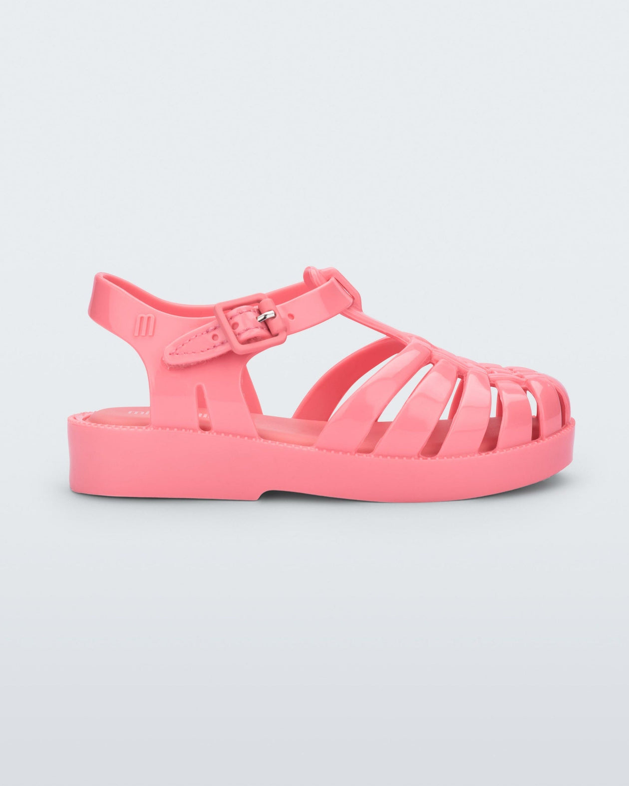 Side view of a light pink Possession baby fisherman sandal.