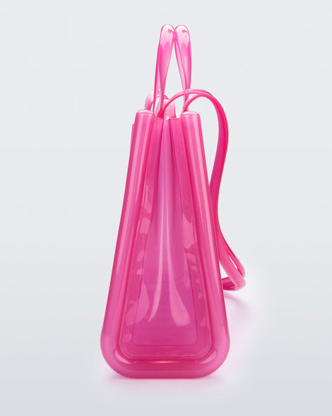 Side view of the pink Large Jelly Shopper x Telfar bag