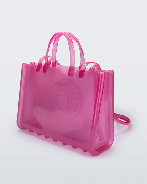 Back view of the pink Large Jelly Shopper x Telfar bag