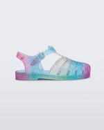 Side view of a pink and blue glitter kids Possession Sandal.