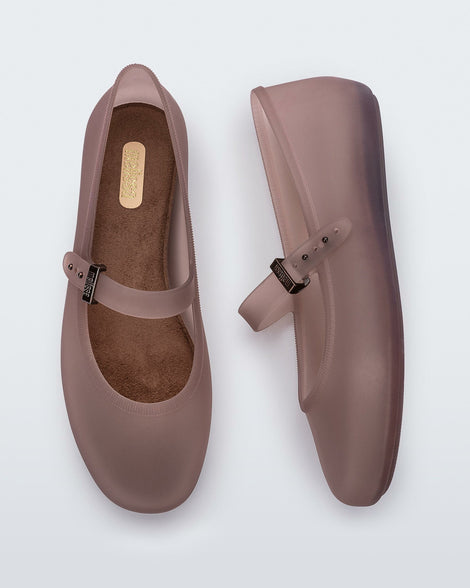 Top and side view of a pair of clear brown Soft Ballerinas