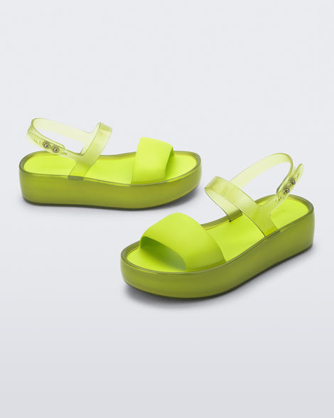 Angled view of a pair of green Float Platforms.