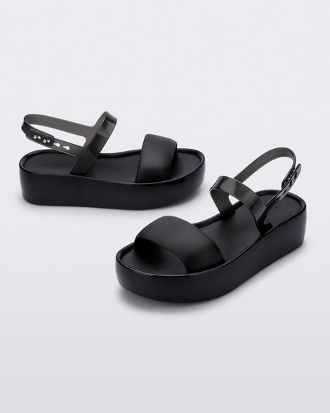 Angled view of a pair of black Float Platforms.