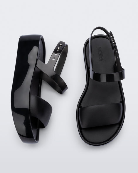 Top and side view of a pair of black Float Platforms.