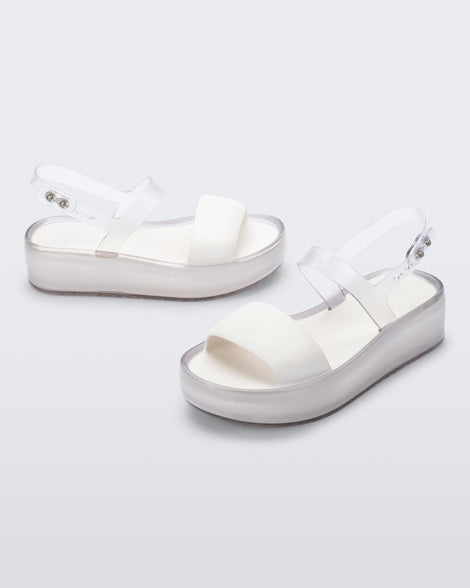 Angled view of a pair of clear/white Float Platforms.