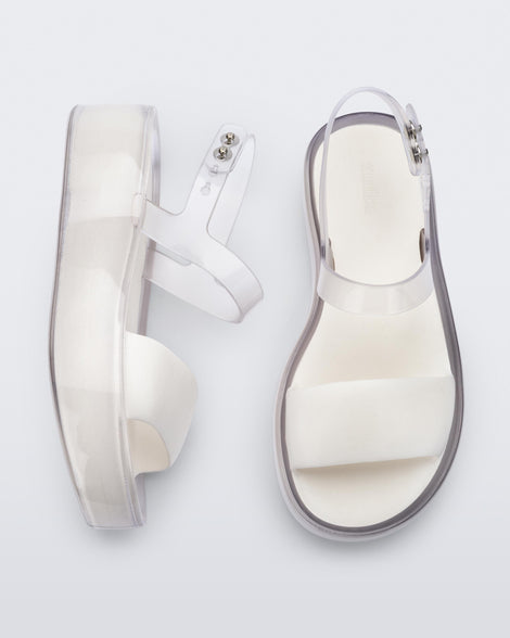 Top and side view of a pair of clear/white Float Platforms.