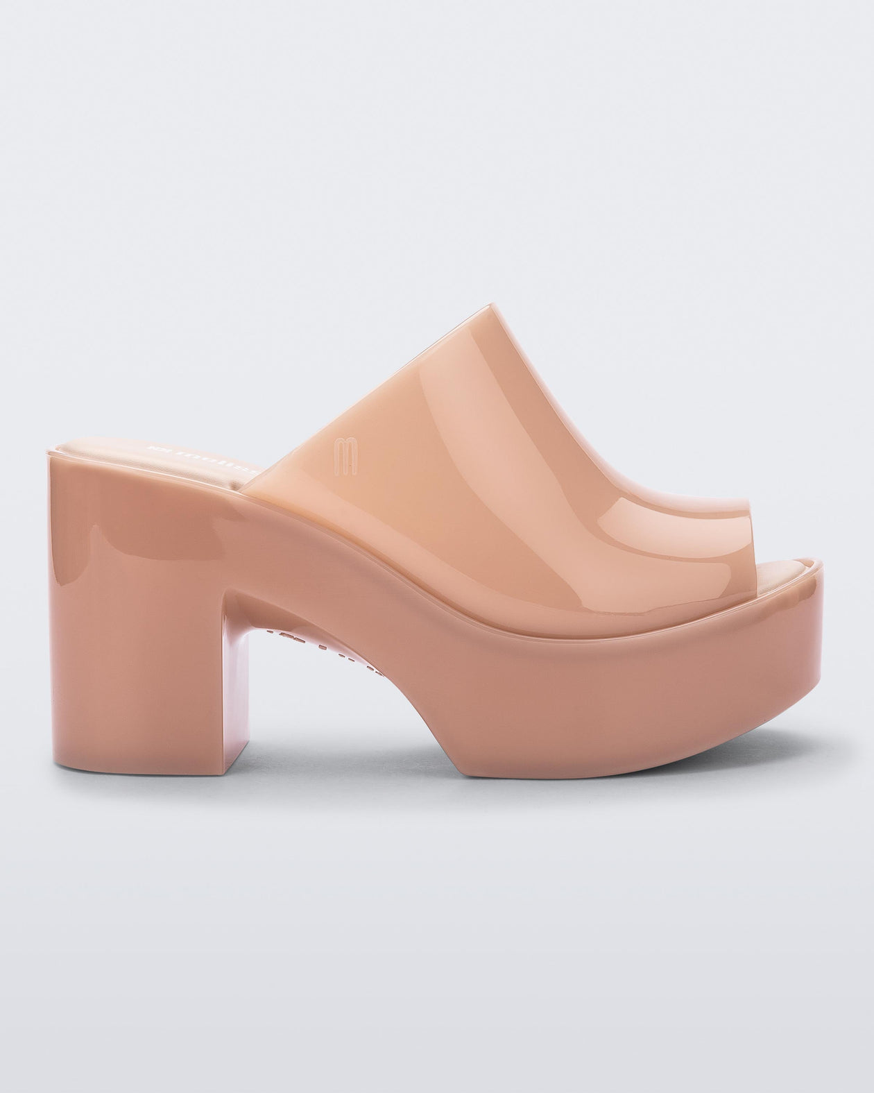 Side view of a pink Mule Hype heel platform