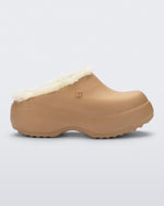 Side view of a dark beige Free Clog Fluffy Platform with light beige fluffy liner