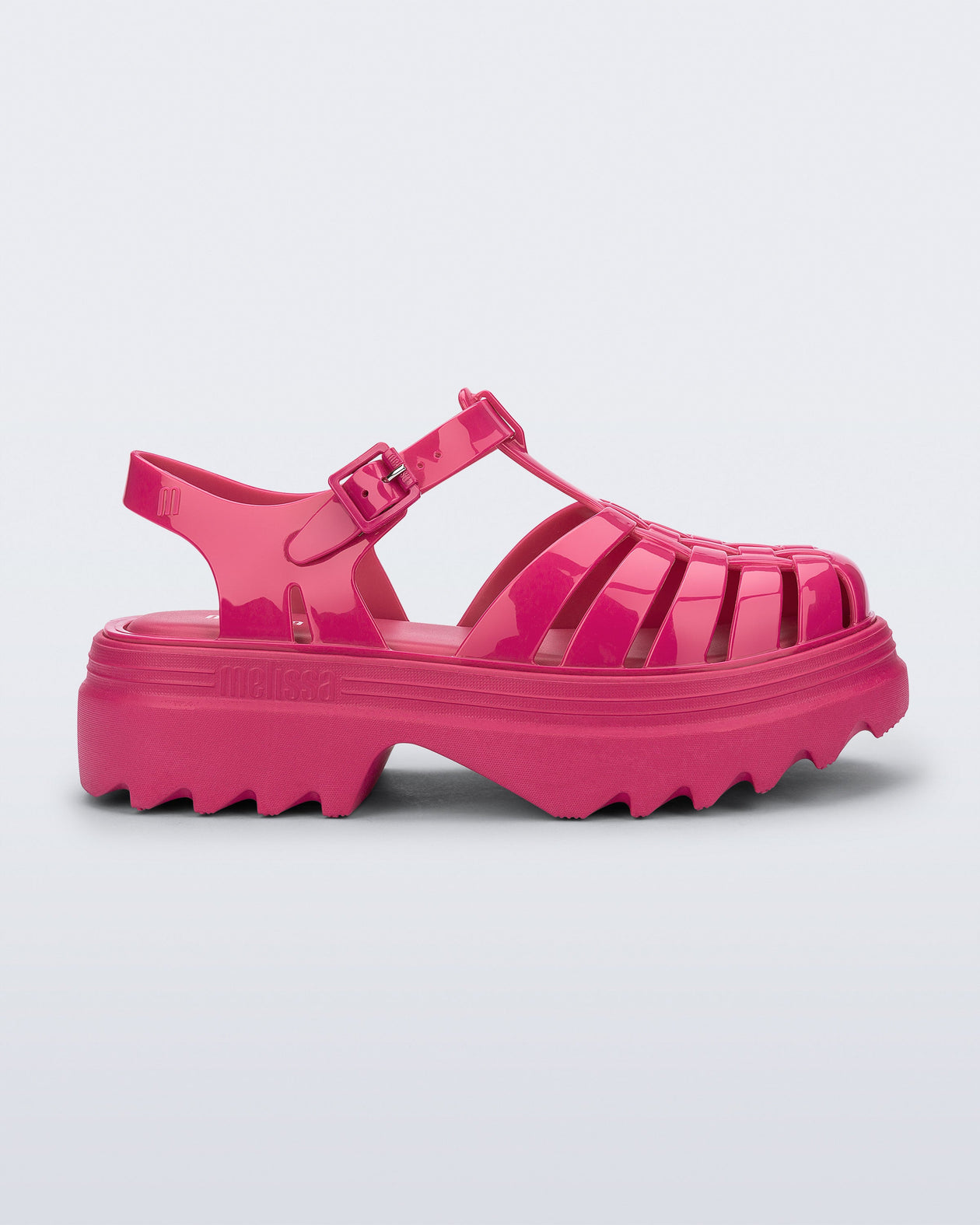 Side view of a pink Possession Platform II sandal.