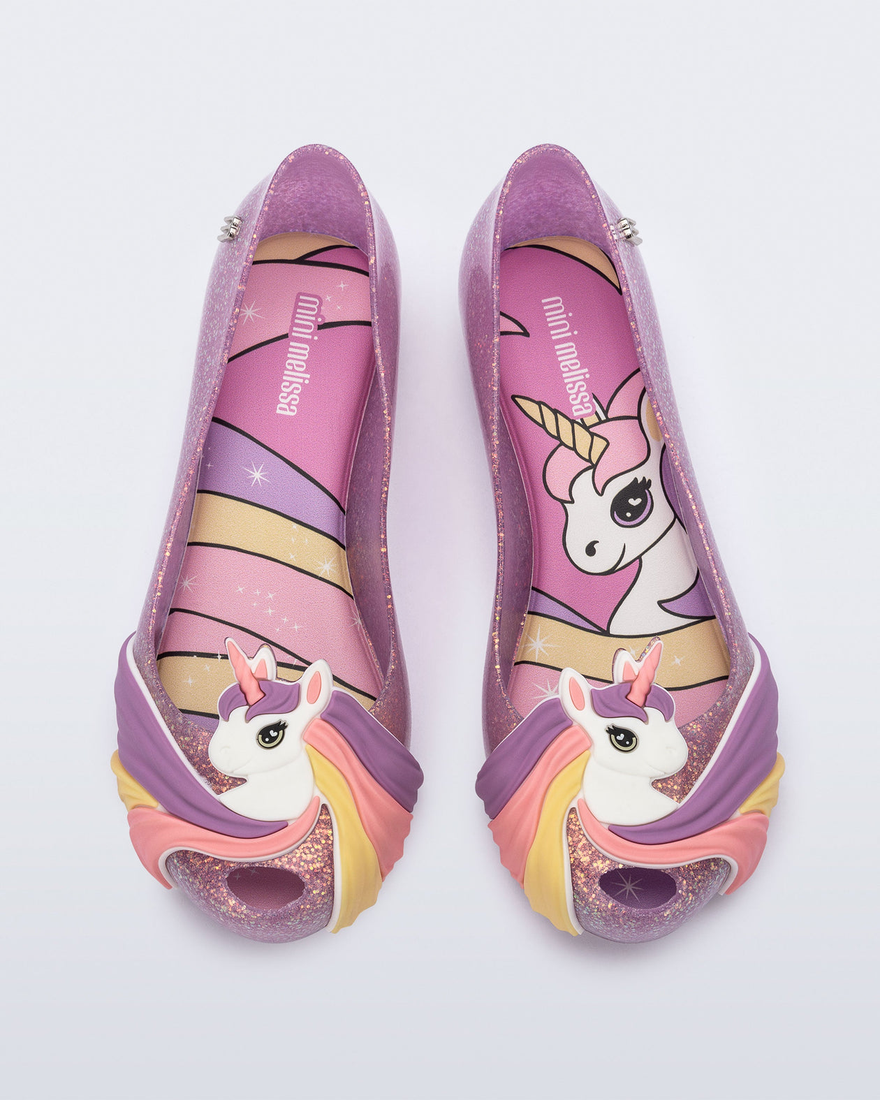 Top view of a glitter lilac kids Ultragirl Unicorn with a unicorn with a rainbow mane on the upper toe area