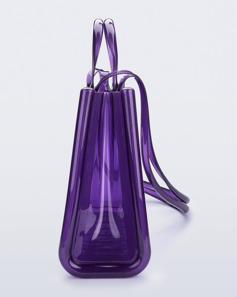 Side view of the purple Large Jelly Shopper x Telfar bag