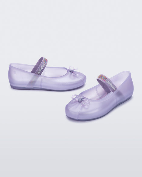 Angled view of a pair of lilac kids Sophie flats