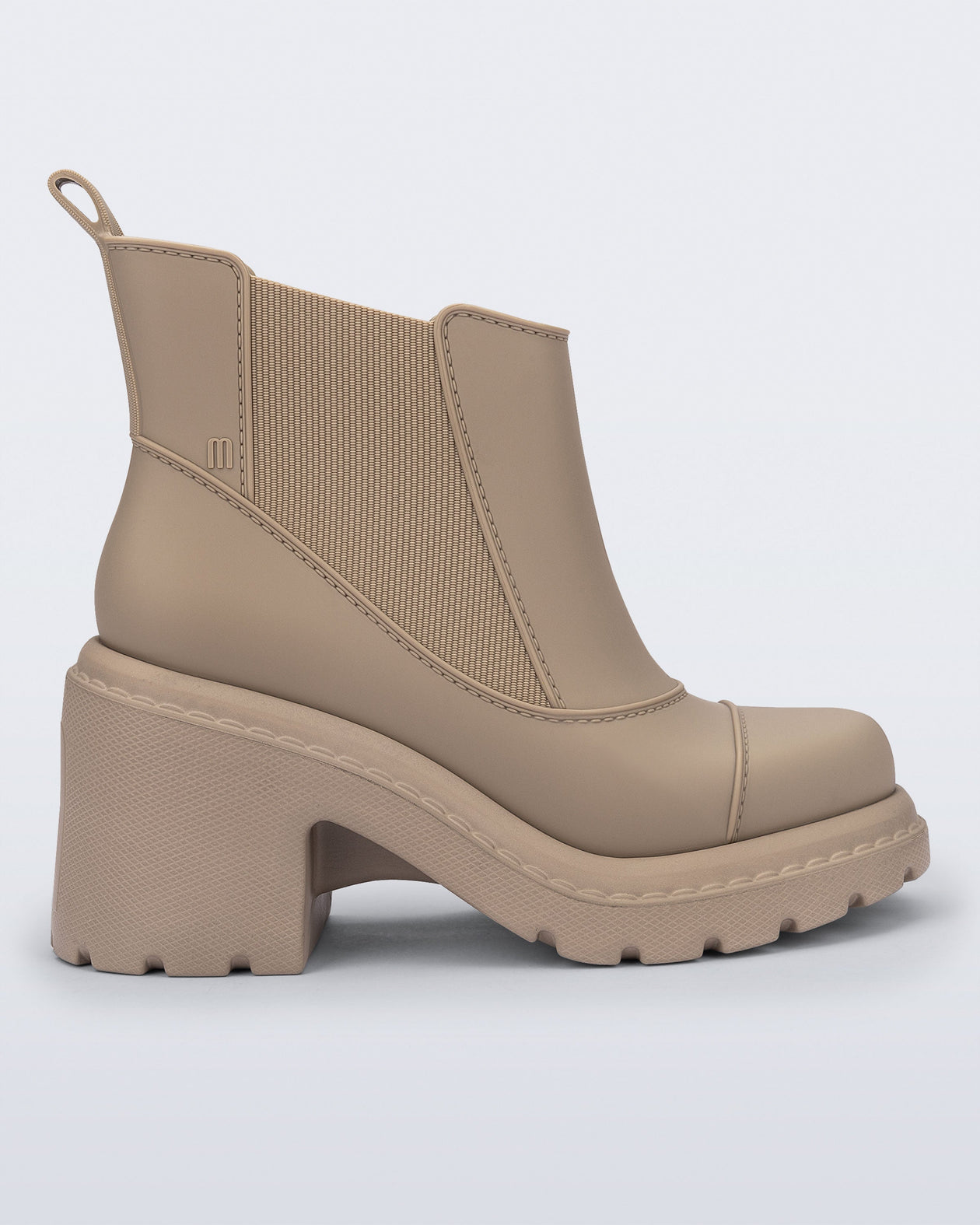 Side view of a beige Courtney boot