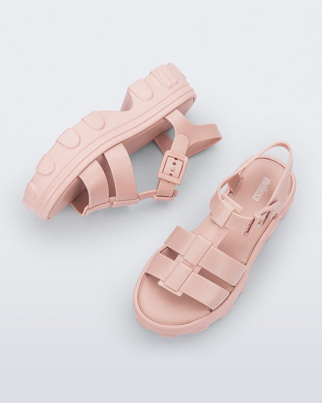 Side and top view of a pair of light pink Ella platform adult sandals