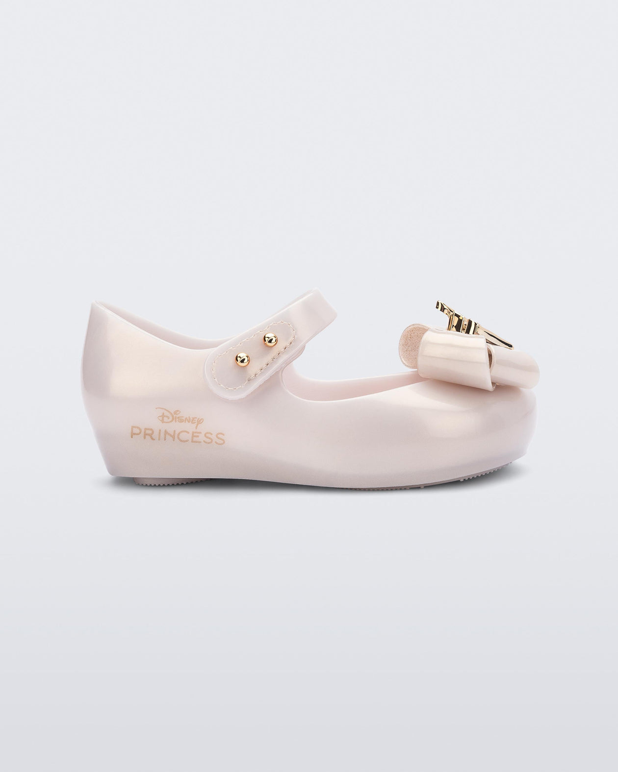 Side view of a metallic beige baby Ultragirl Princess Flat