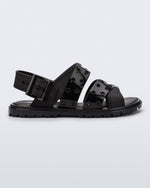 Side view of a black Lock Sandal with back strap