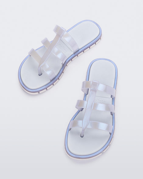 Top view of a pair of pearly blue Path adult sandals with  blue sole