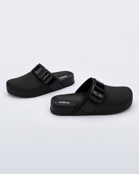 Angled view of a pair of adult black Cozy Clog.