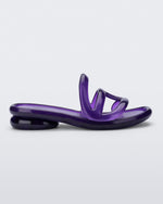 Side view of a purple Jelly Slide x Telfar.