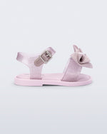 Side view of a  glitter pink Mar Sweet baby sandal