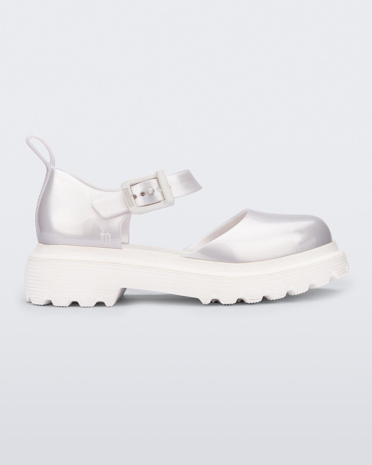 Side view of a Pearly white Ellie ankle strap loafer