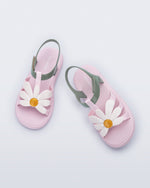 Top view of a pair of pink and green kids Hip Bloom sandal.