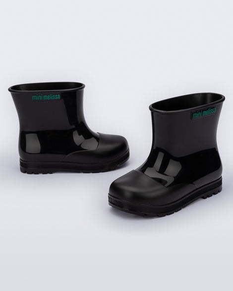 Back and angled view of a pair of black baby Welly rainboots.