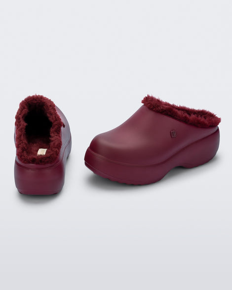 Back and side view of a pair of red Free Clog Fluffy Platforms