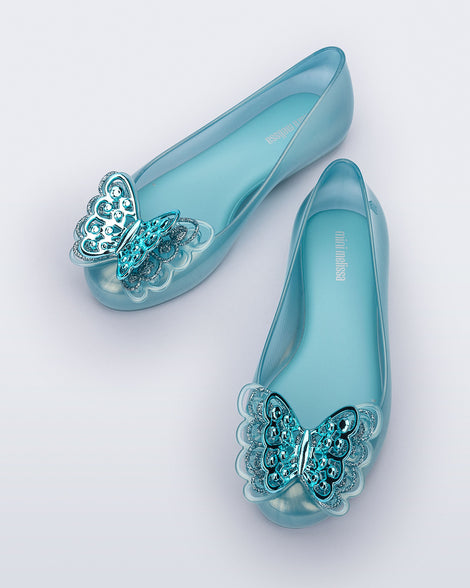 Top view of a pair of blue Sweet Love kids flats