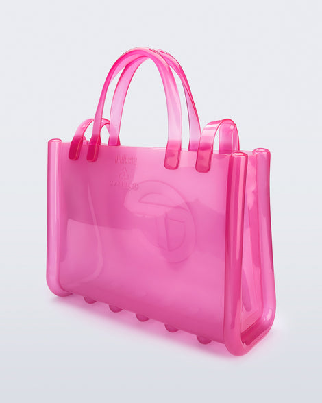 Back view of the pink Medium Jelly Shopper x Telfar bag