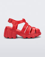 Side view of a red kids Megan heeled sandal