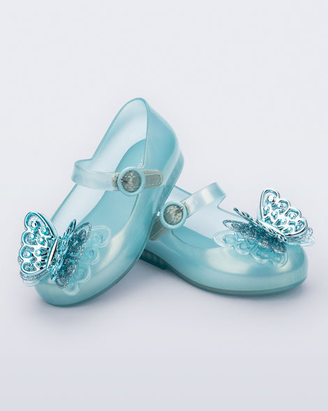 Angled view of a pair of blue Sweet Love baby flats